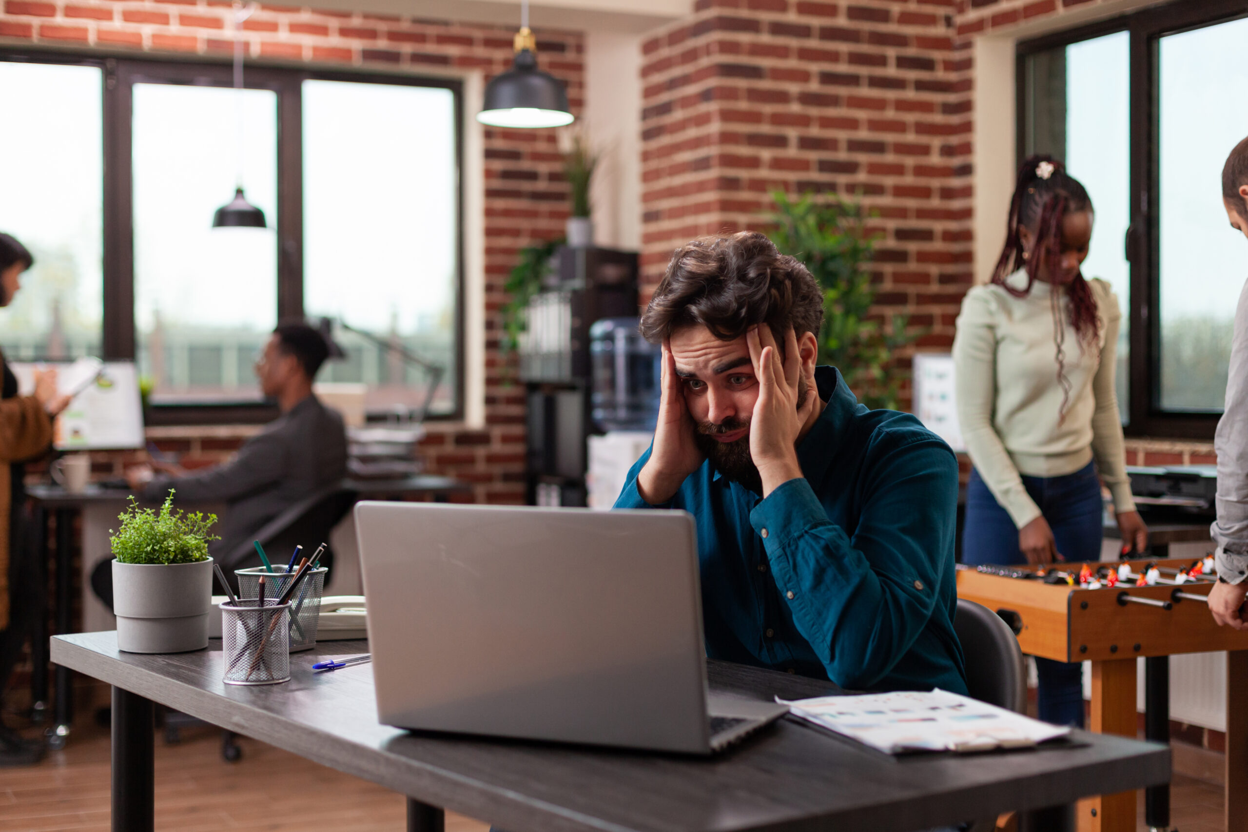 cover image banner for the blog a tired MSp sitting on his desk with hands on his head due to poor doeumentation The Complete Guide to MSP Documentation: Save Time, Reduce Errors, Scale Faster